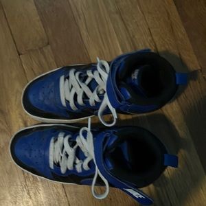 Black and blue Nike shoes